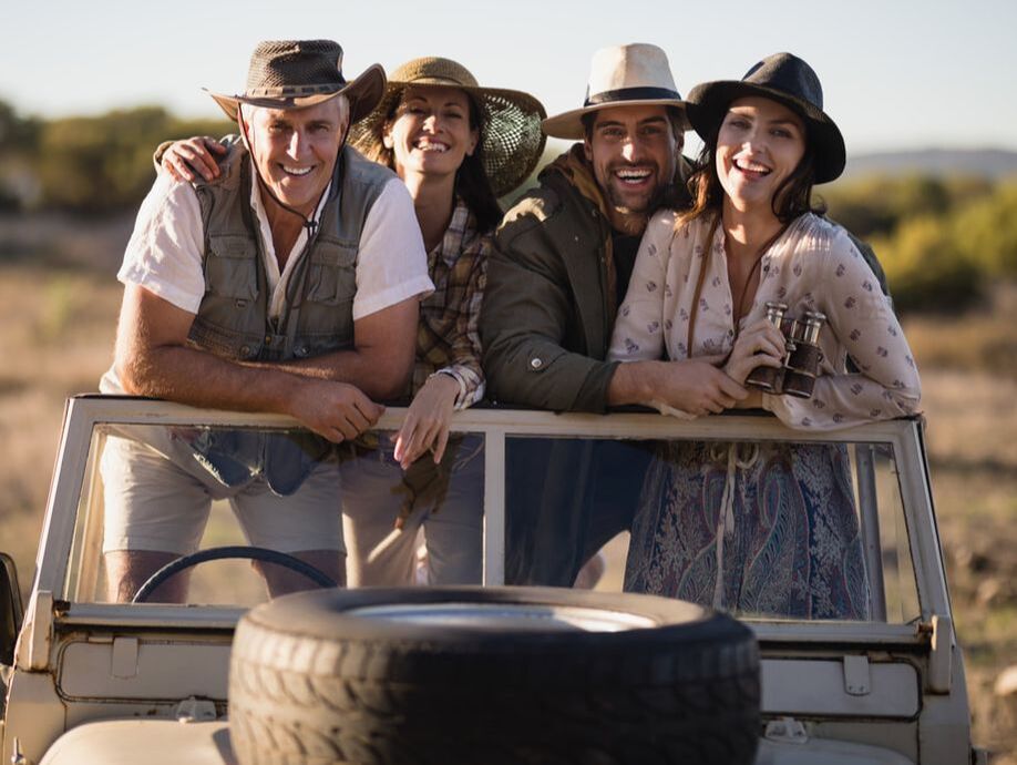 smiling safari couples